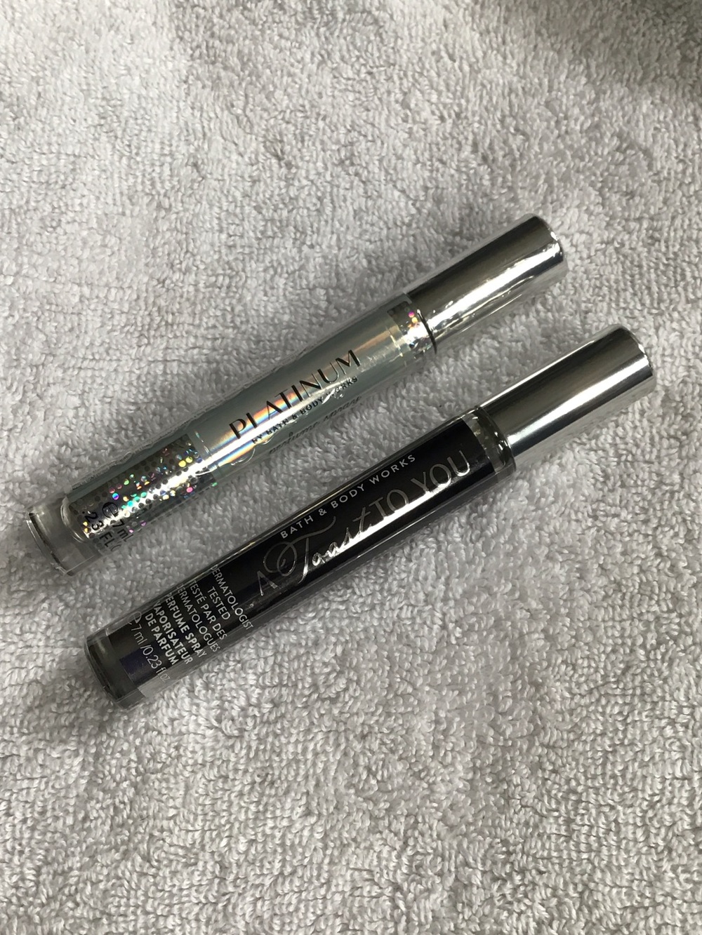 Bundle of 2 Bath & Body Works mini spray A Toast To You & Platinum